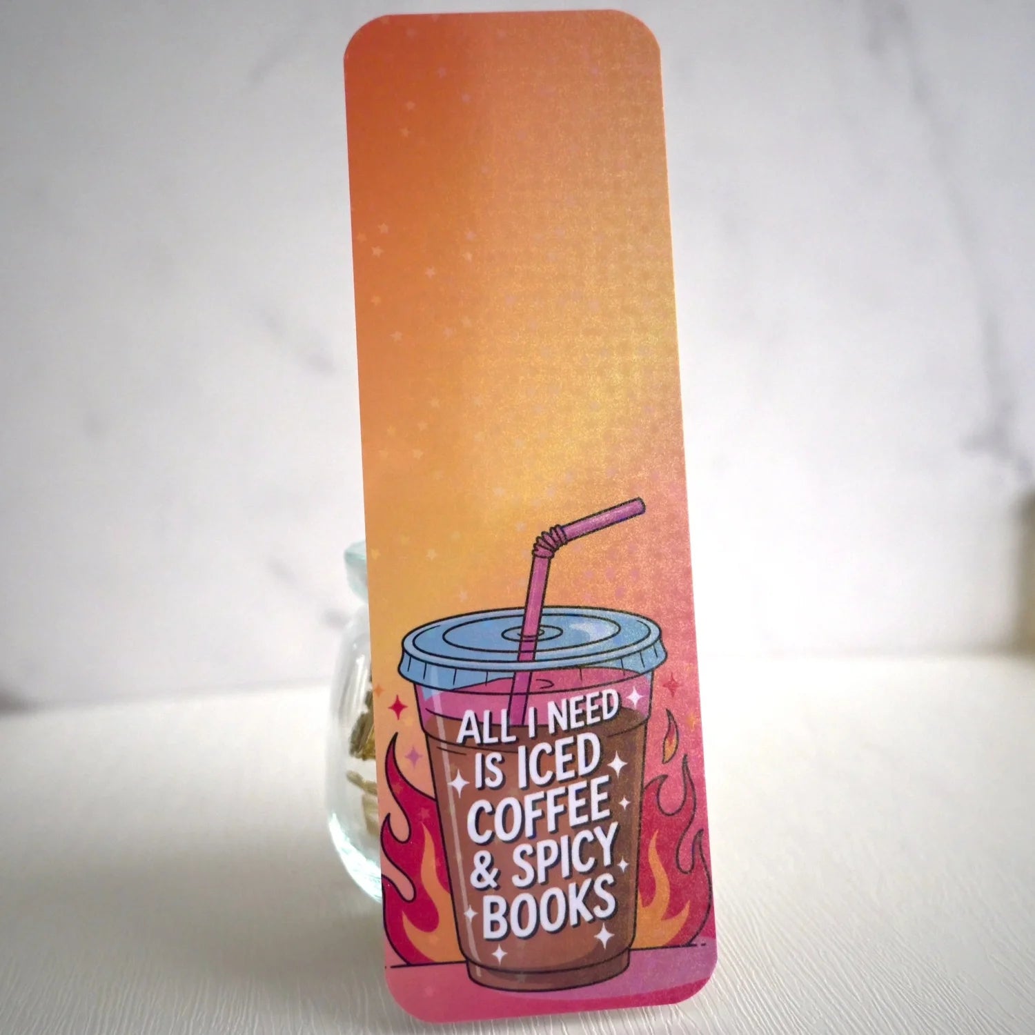 Book with a design of iced coffee and spicy books on a white background